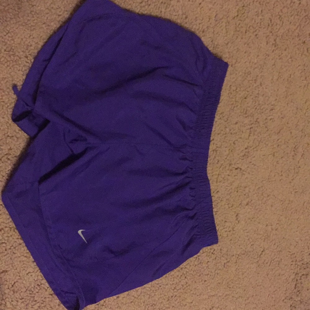 Purple Nike shorts